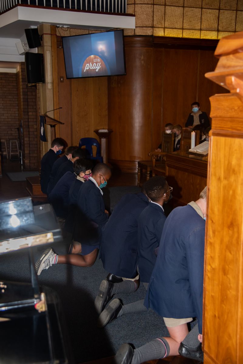 Chapel stewards kneeling