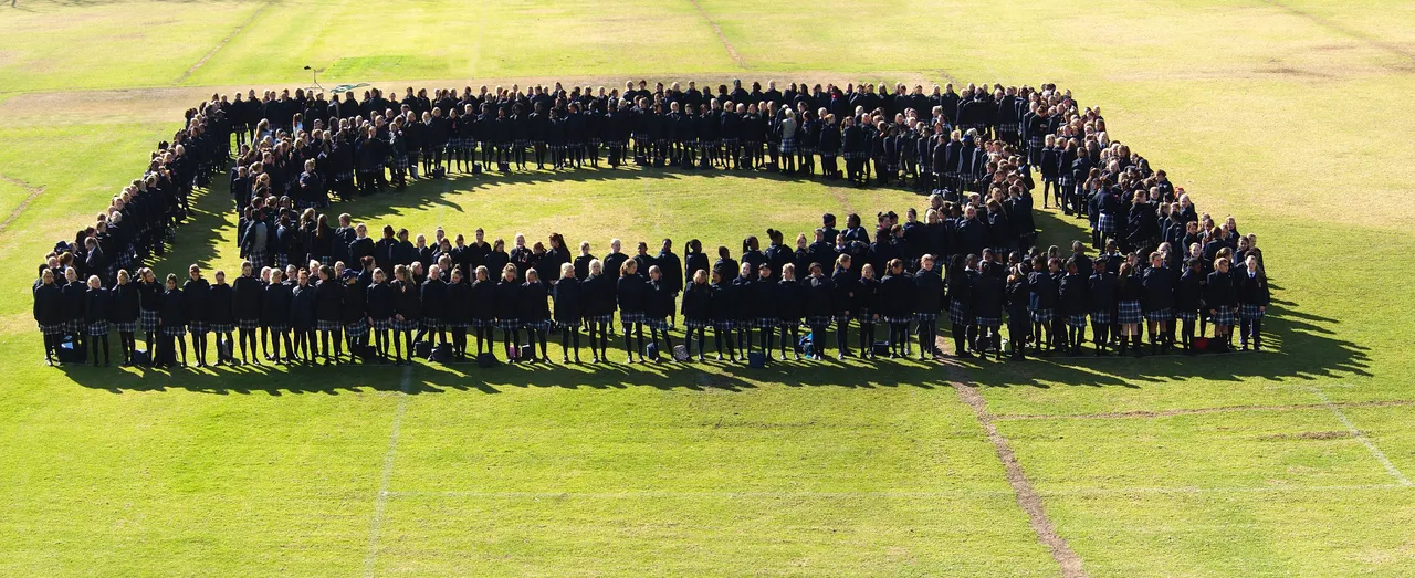 RS badge with students sewn