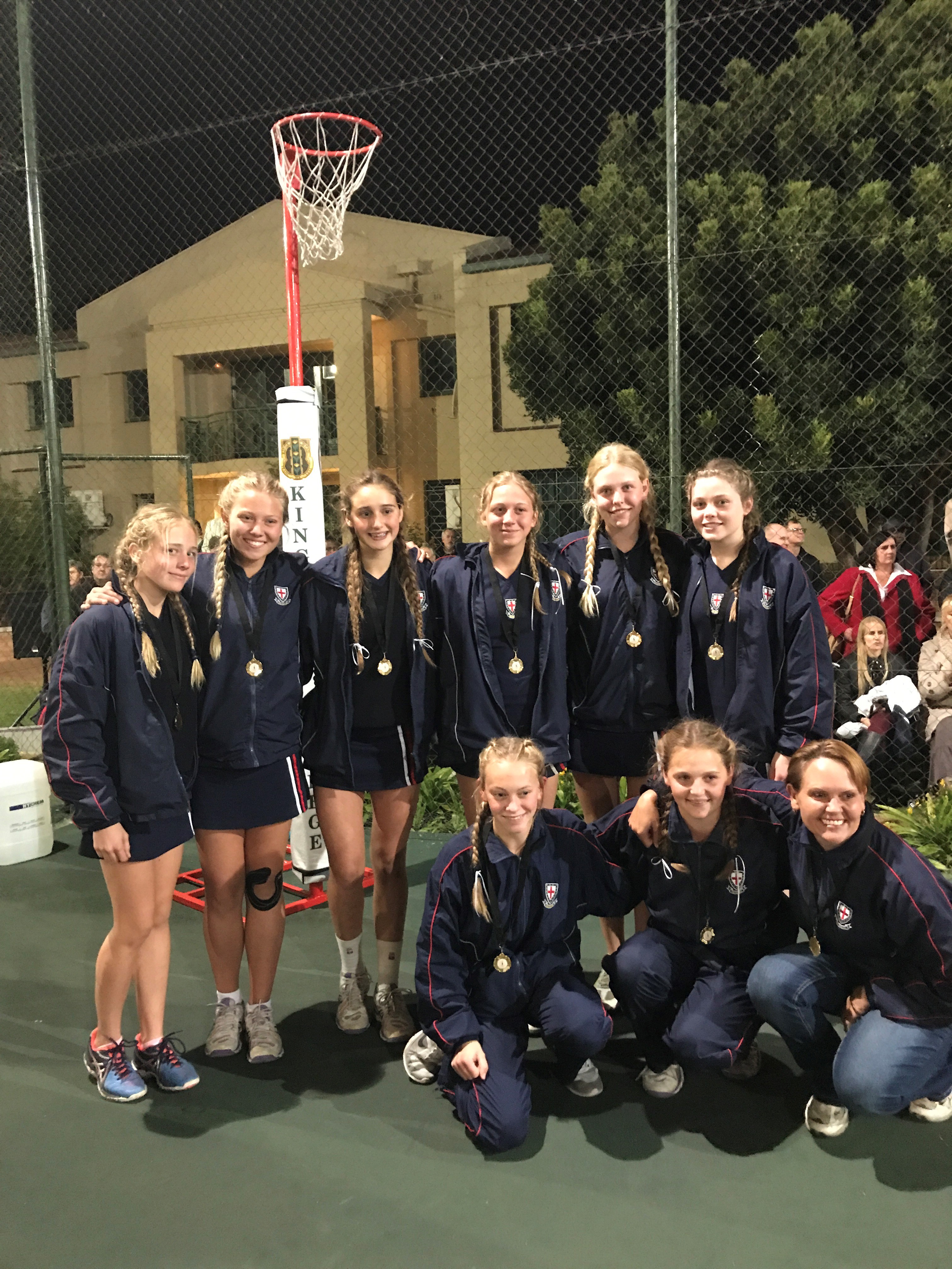 U15 playoffs win medals